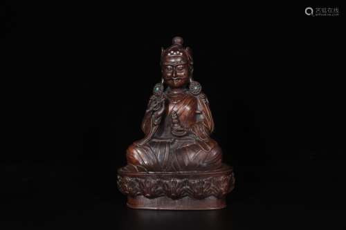 A Chinese Carved Agar-Wood Buddha