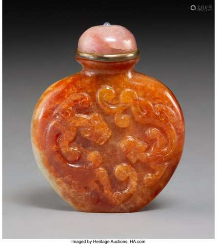 78033: A Chinese Carved Celadon and Russet Jade Snuff B