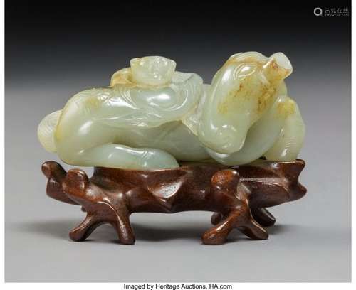 78080: A Chinese Carved Celadon Jade Monkey on Horsebac