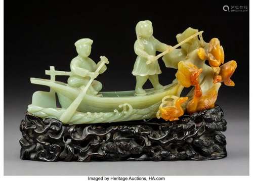 78085: A Chinese Carved Celadon and Russet Jade Boat on