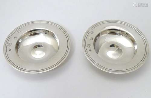 A pair of silver pin dishes formed as miniature Armada