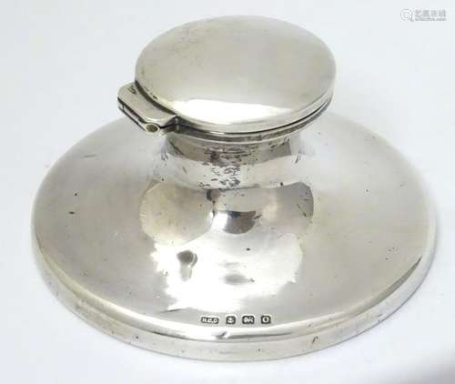 A silver capstan formed inkwell hallmarked Birmingham