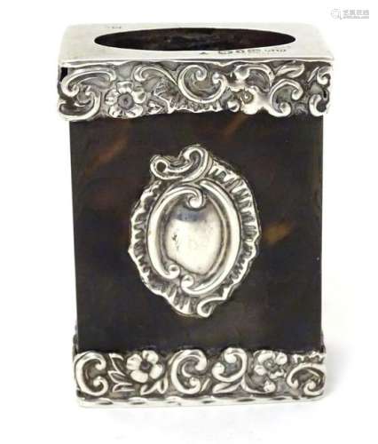 A silver and tortoiseshell matchbox holder / cover