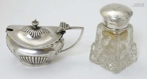 A silver mustard pot hallmarked Sheffield 1897 maker