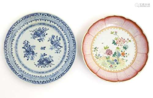 An 18thC Chinese blue and white plate decorated with