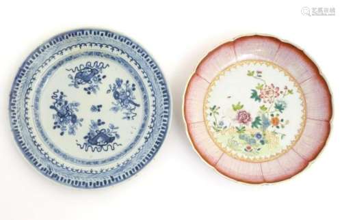 An 18thC Chinese blue and white plate decorated with