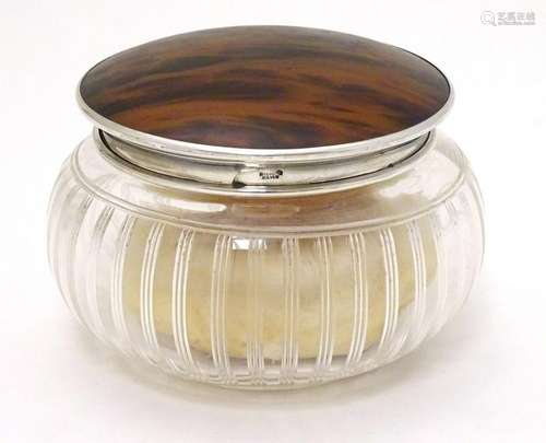 A cut glass powder bowl with faux tortoiseshell lid and