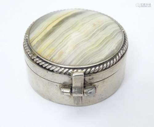 A silver plate box of circular form set with agate /
