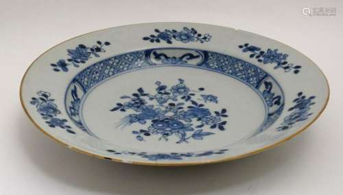 A blue and white Chinese ceramic plate. Decorated with