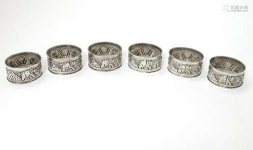 A set of 6 Anglo Indian silver napkin rings decorated