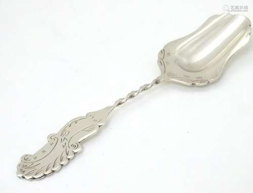 A Continental white metal spoon marked Sola 5'' long