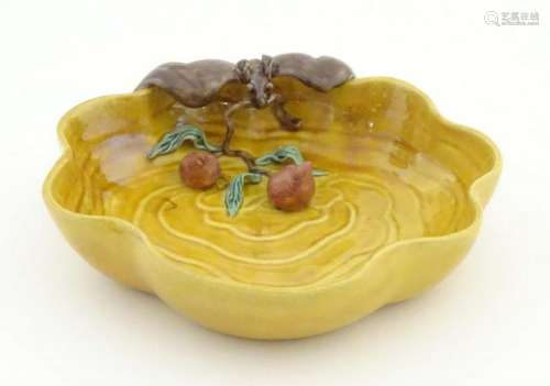 A Chinese wavy edged yellow brush wash dish with bat