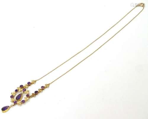 An early 20thC 15ct gold necklace set with seed pearls