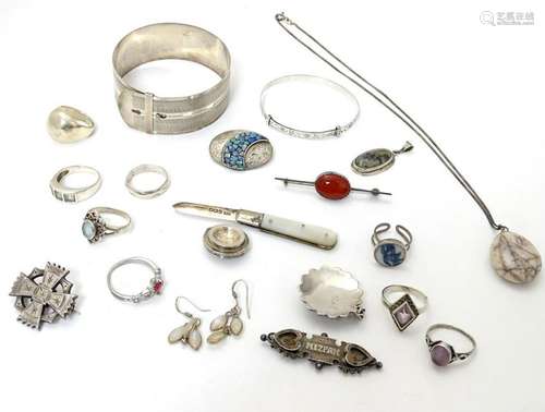 Assorted items including a silver bangle brooch, a