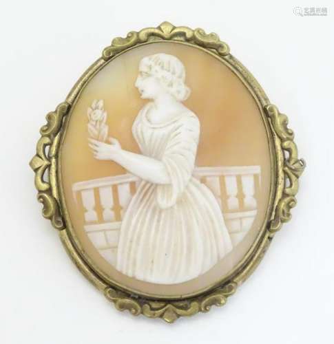 A 19thC shell carved cameo brooch depicting a lady on