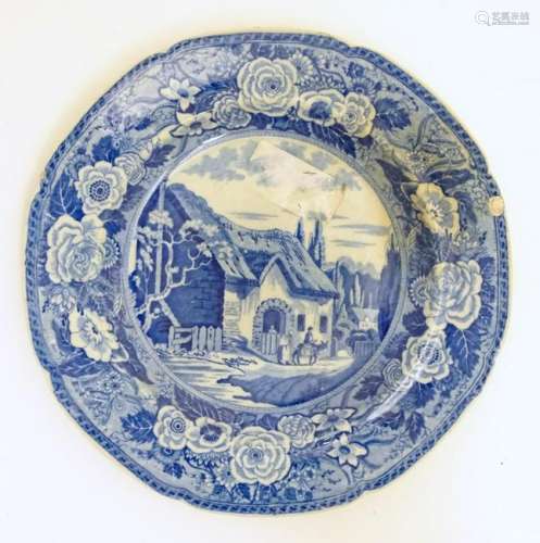 A 19thC blue and white transferware plate depicting a