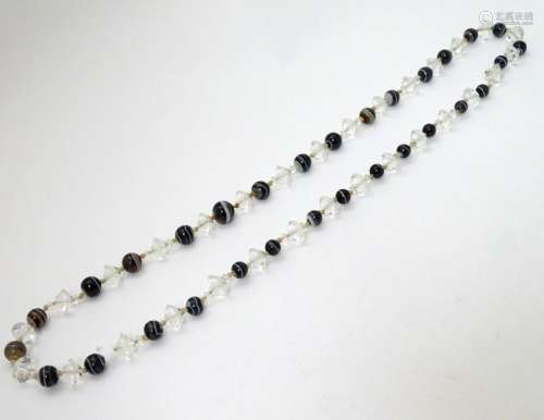 A bead necklace set with graduated banded agate