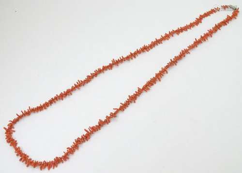 A vintage coral necklace formed from coral branch