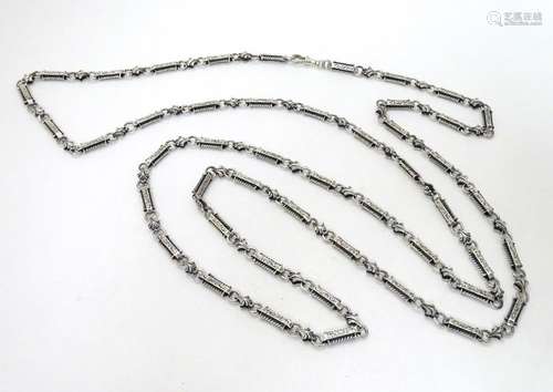 A silver long guard chain approx  60'' long