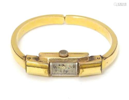 Le Phare: a rolled gold and gold plate bracelet watch