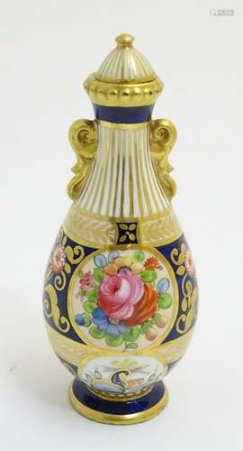 A small Crown Staffordshire lidded vase with panelled