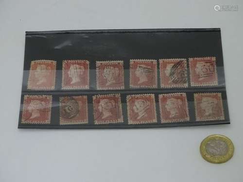 Stamps: A book of ten Victorian Penny Red stamps