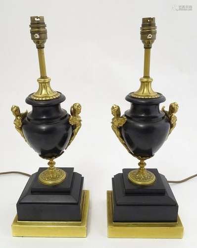 A pair of Regency styles patinated bronze, brass and