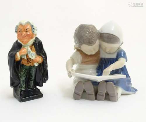 A Royal Doulton figurine of the Charles Dickens