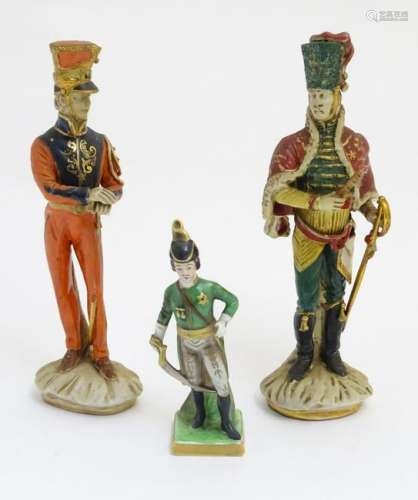 A group of three ceramic military figures made in