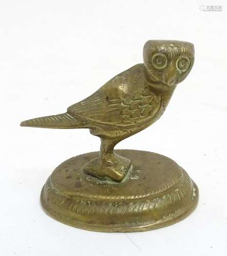 A circa 1900 cast brass Persian style figure of an owl,