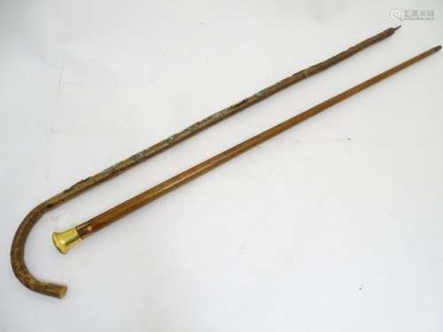 Walking Sticks: two sticks to include a gilt metal