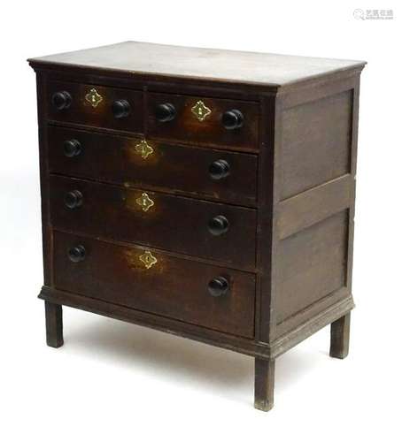 An early 18thC oak chest of drawers comprising two