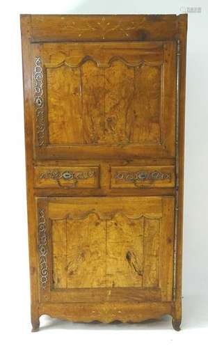 A mid 19thC walnut continental armoire with painted