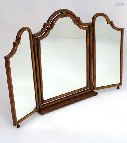 An early / mid 20thC walnut dressing table mirror, with