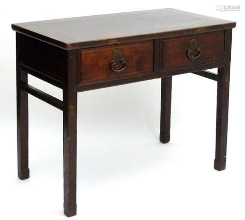 A 19thC Oriental hall table, of elm construction with