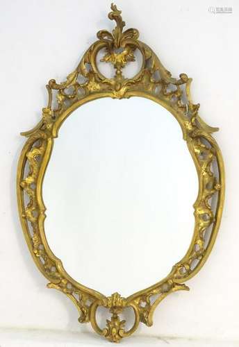 A Chippendale style giltwood mirror. 25'' wide x 29''