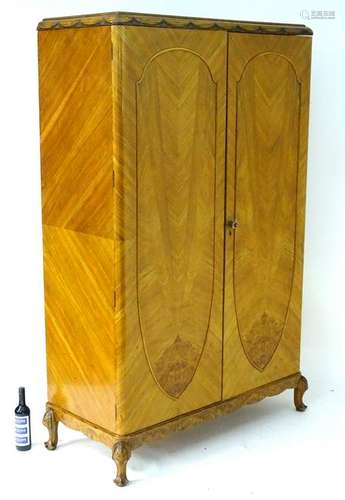 An early / mid 20thC walnut Art Deco compactum wardrobe