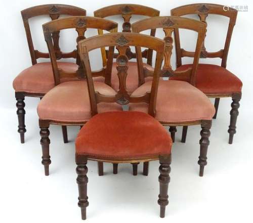 A set of six late Victorian mahogany dining chairs with
