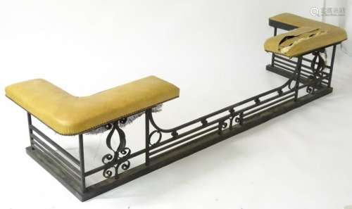 A large Arts & Crafts wrought iron club fender, raised