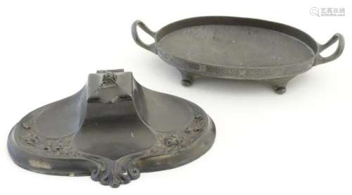 Decorative metalware : an ornate pewter desk inkwell /
