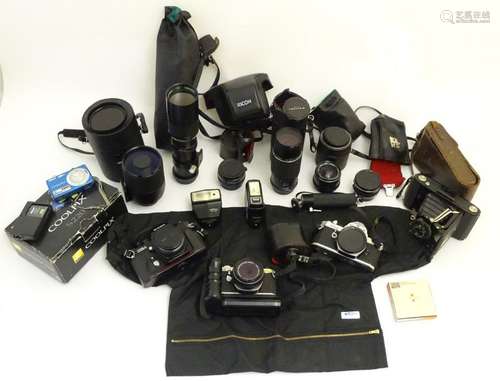 Photography interest: A quantity of cameras and camera