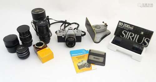 Photography interest: A quantity of camera equipment to