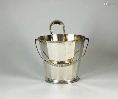 An Egyptian silver ice bucket