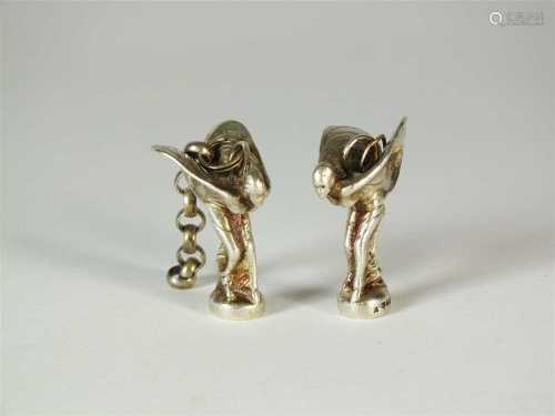 A pair of miniature silver 'Spirit of Ecstasy' models