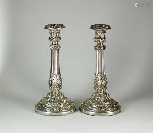 A pair of George IV silver mounted candlesticks