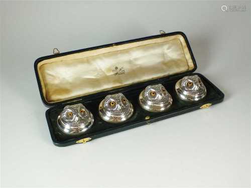 A cased set of four Edwardian novelty silver menu holders