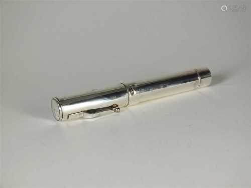 A novelty silver cigar holder