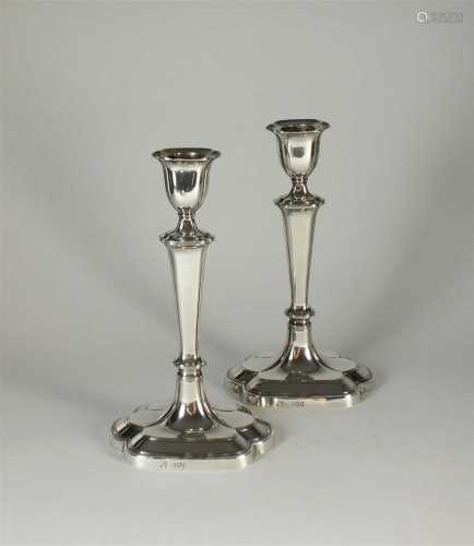 A pair of silver candlesticks