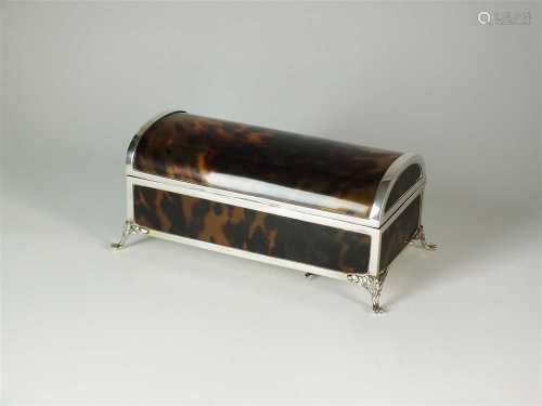 A silver mounted tortoiseshell musical trinket box