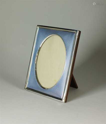 An early 20th century silver and blue guilloche enamel frame